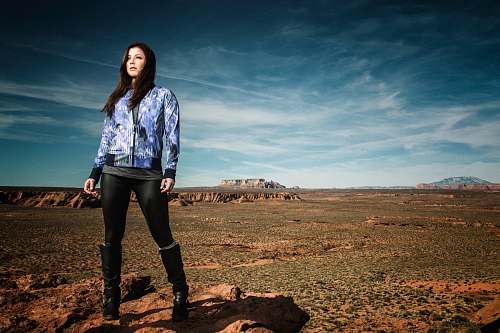 people woman standing on brown soil person