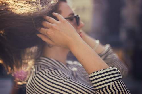 people woman touching her hair person