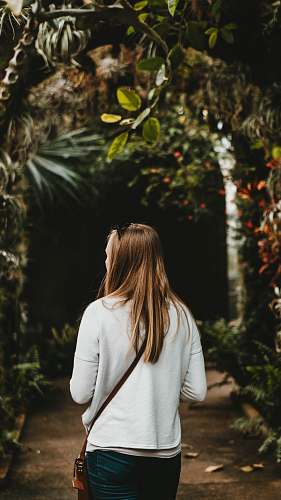 people woman walking in brown garden person