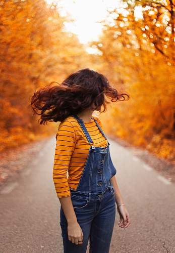 people woman wearing blue overalls person