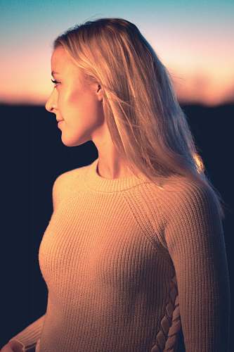 people woman wearing brown long-sleeved top person