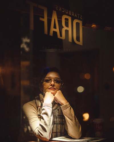 people woman wearing sunglasses holding her chin person