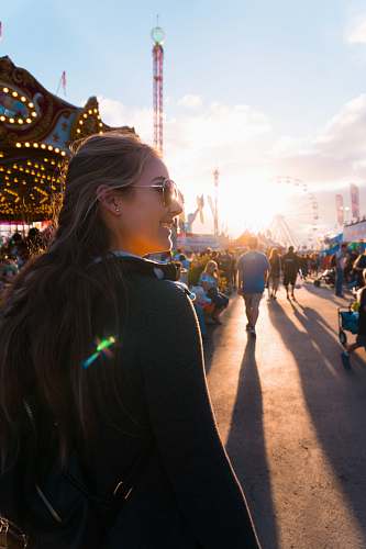 people woman wearing sunglasses on themed park person