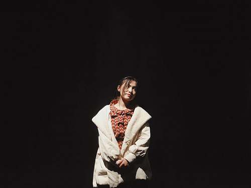 people woman wearing white jacket person