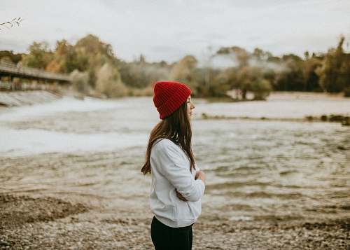 person woman wearing white sweater people
