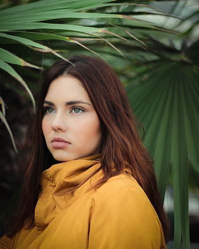 people woman wearing yellow shirt person