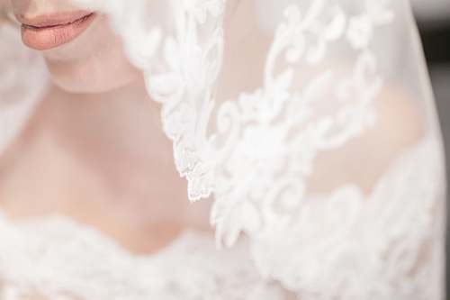 wedding macro shot of white veil bride