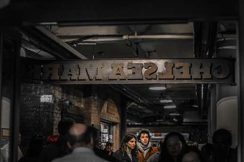 human Chelsea Mark signage person