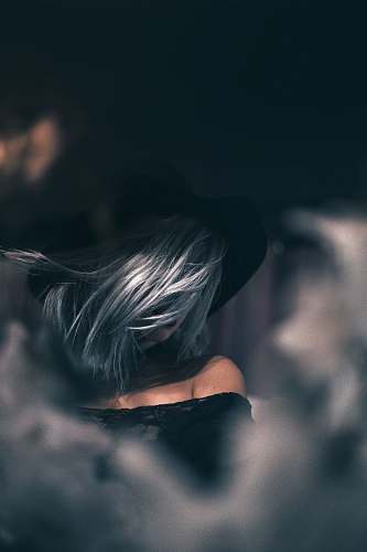 human closeup photo of woman wearing off-shoulder top person