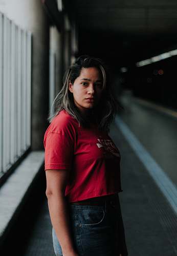 human depth of field photography of woman in red crop top person