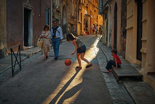 human girl playing ball person