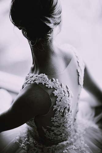wedding grayscale photography of a woman in lace sleeveless dress grey