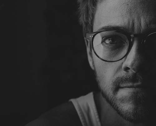 black-and-white grayscale photography of man portrait