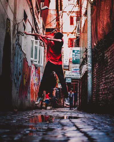human lime-lapse photography of man jumping person