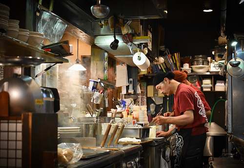 person man cooking inside kitchen human