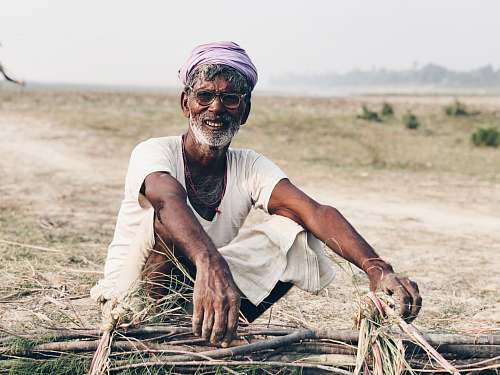 human man holding branch person