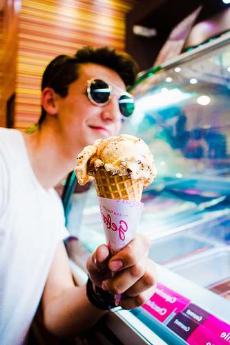 human man holding ice cream person
