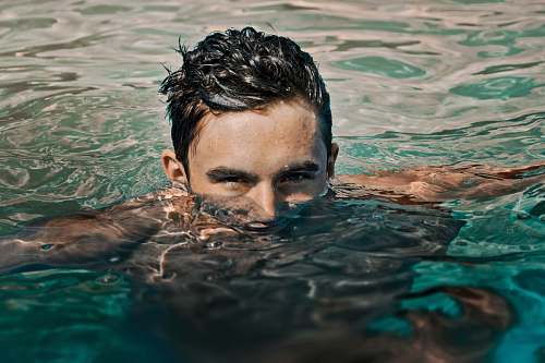 water man in water swimming