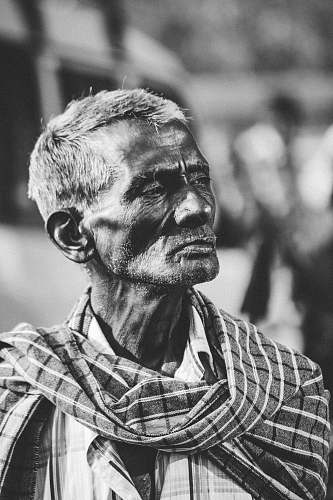person man looking sideward black-and-white