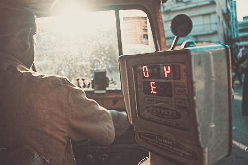 human man riding in vehicle person