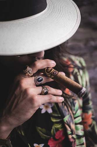 jewelry man smoking cigar ring