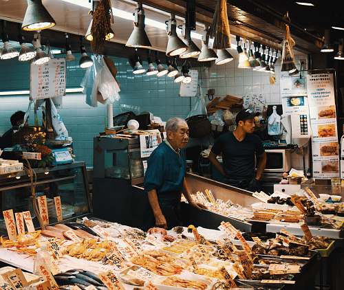 human man standing on kitchen person