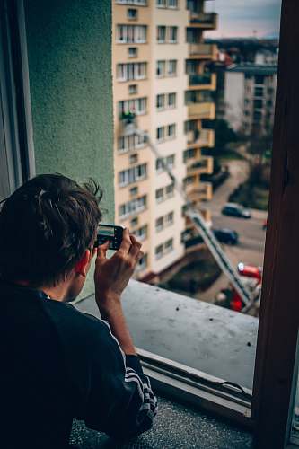 human man taking photo person