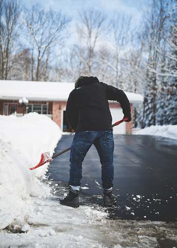 person person shoveling snow snow