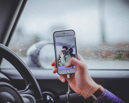 person person taking selfie inside the car human