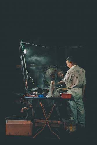 human person using grill person