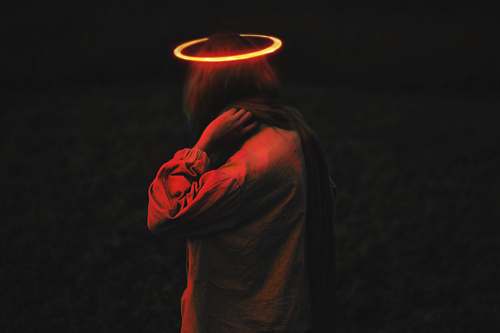 human person wearing long-sleeved top with halo person