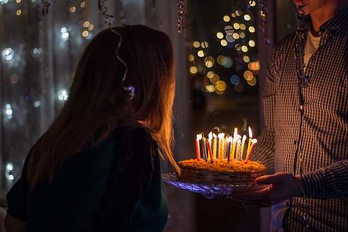 human photo of birthday birth about to blow birthday candles cake
