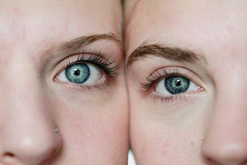 human photo of woman's face reflection person