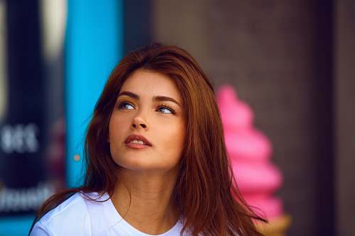 person selective photography of woman in white crew-neck shirt human