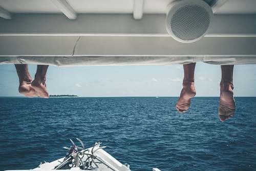 human two person on powerboat deck person