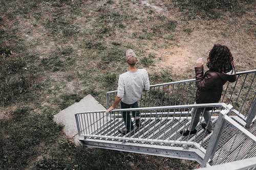 human two person walking on the stair person