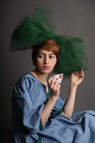 human woman holding teacup person
