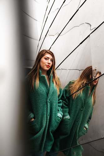 human woman leaning against mirror person