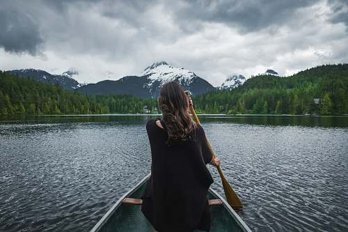 human woman riding boat sailing person