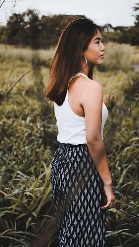 person woman standing on grassy area human