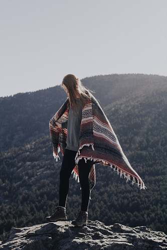 human woman standing on mountain person