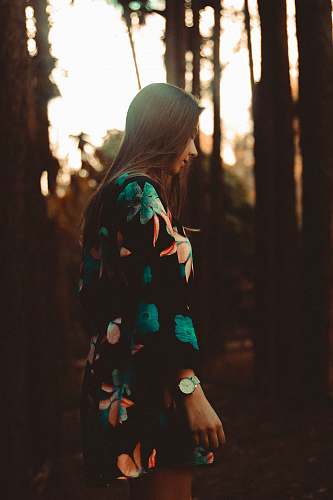 human woman standing under tree photo person