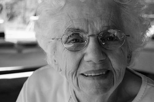 black-and-white woman wearing eyeglasses portrait