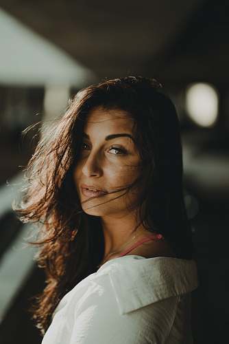 human woman wearing white shirt person