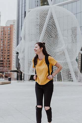 person woman wearing yellow t-shirt laughing human