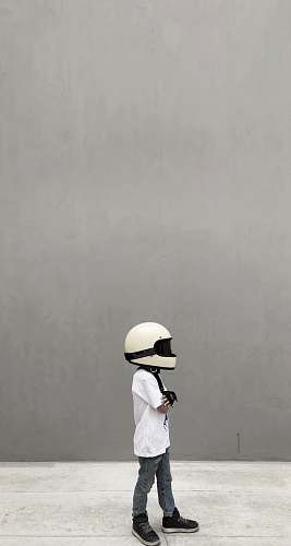 human boy wearing full-face helmet people
