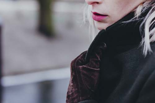 people closeup photo of woman wearing black and brown top human