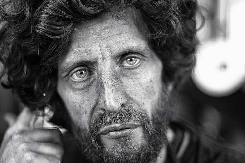 human grayscale photography of man's portrait black-and-white