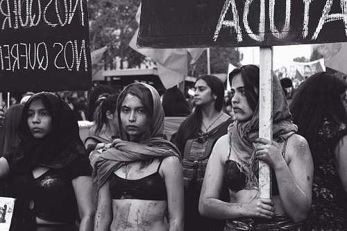 human grayscale photography of women marching people