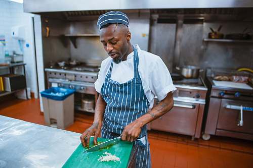 people man chopping garlic gloves human